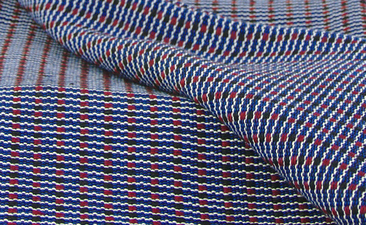 Woven cushion ABILITY (wine red, black, dark blue)