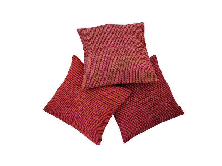 Woven cushion ABILITY (wine red, pink, orange)